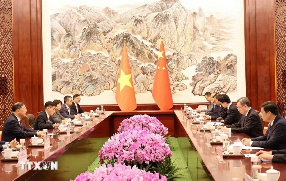 Phó Thủ tướng Thường trực Chính phủ Phạm Gia Túc hội đàm với Phó Thủ tướng Thường trực Quốc vụ viện Trung Quốc Đinh Tiết Tường